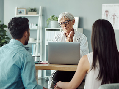 couple consults with doctor